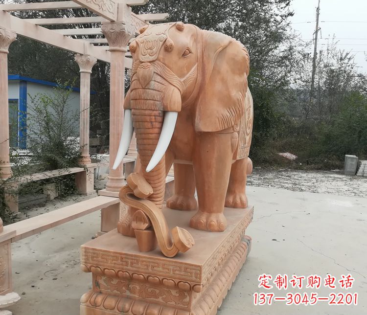 福建鼻卷如意的大象晚霞红门口镇宅石雕