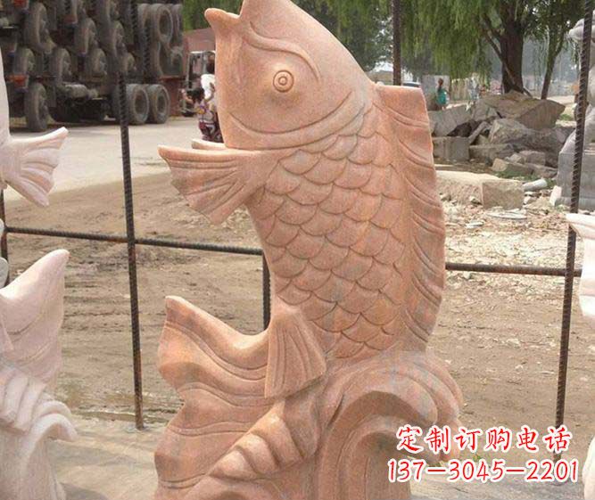 福建公园景观晚霞红石雕鱼喷泉