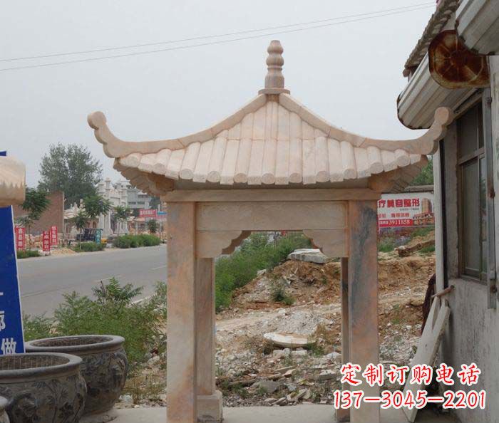 福建公园晚霞红四角石雕凉亭