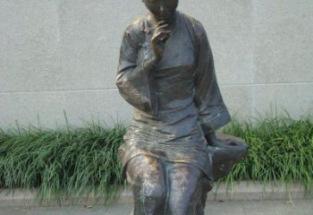 福建描绘心灵世界的街边低头思考的女孩景观铜雕