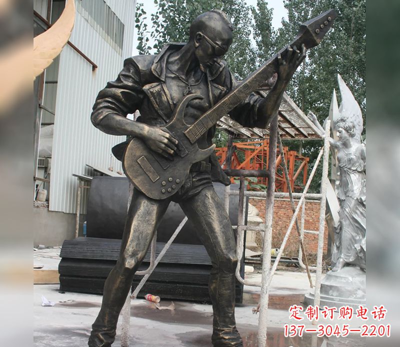福建男人弹吉他人物景观铜雕