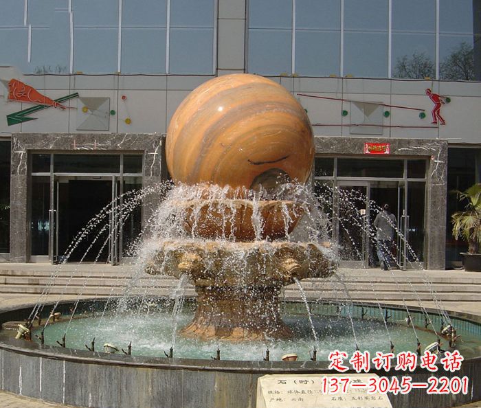 福建石来运转球晚霞红风水球石雕
