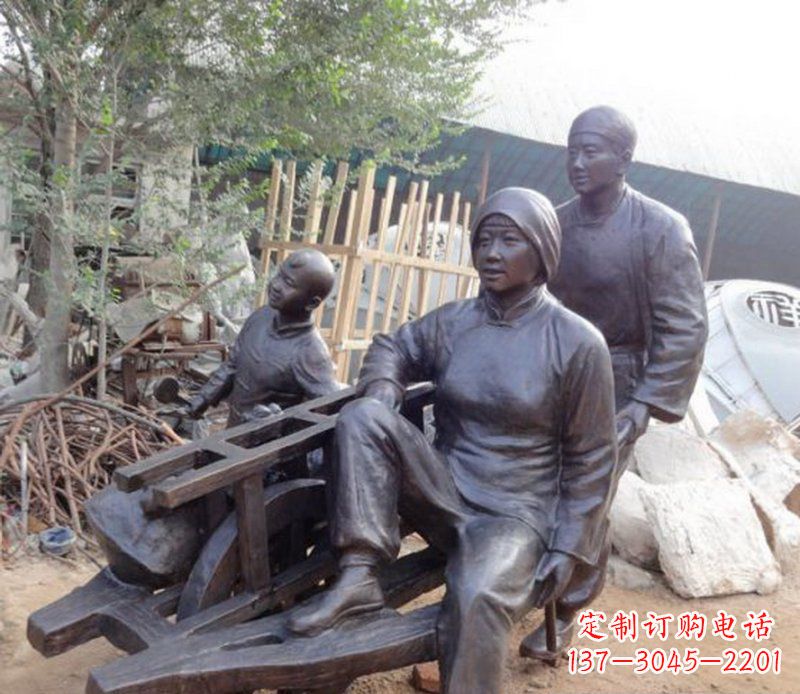 福建推独轮车人物铜雕