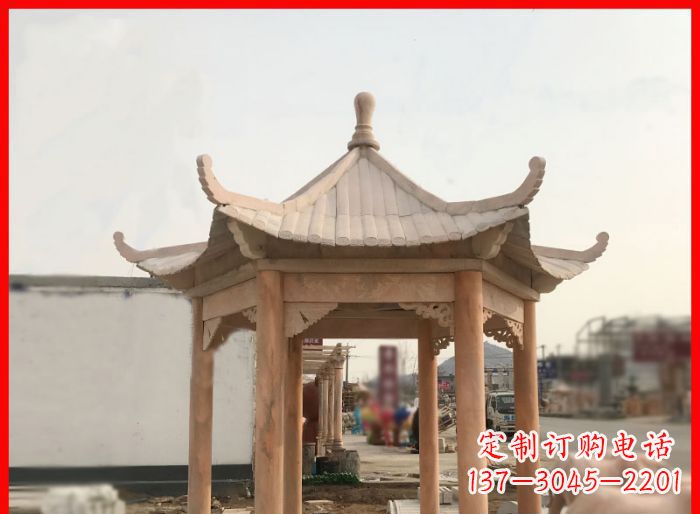 福建晚霞红公园六角石雕凉亭