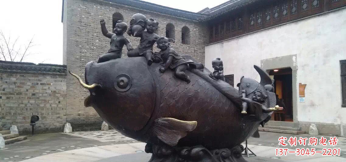 福建小孩骑鱼铜雕