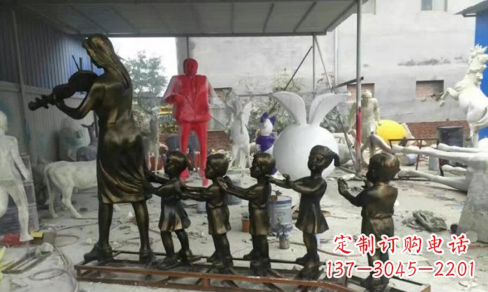福建校园老师和儿童铜雕