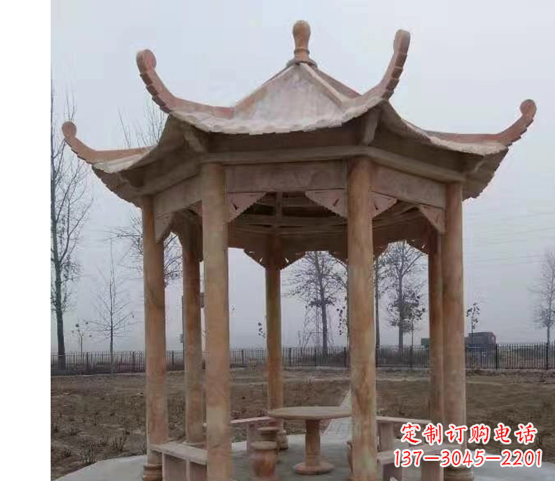 福建公园晚霞红八角石雕凉亭