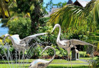 福建鹤雕塑-公园池塘不锈钢镜面抽象喷泉中的鹤雕塑