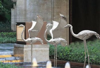 福建鹤雕塑-公园不锈钢镜面喷泉中的鹤雕塑